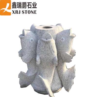 statue of  Carp fish  jumps carving made of Granite